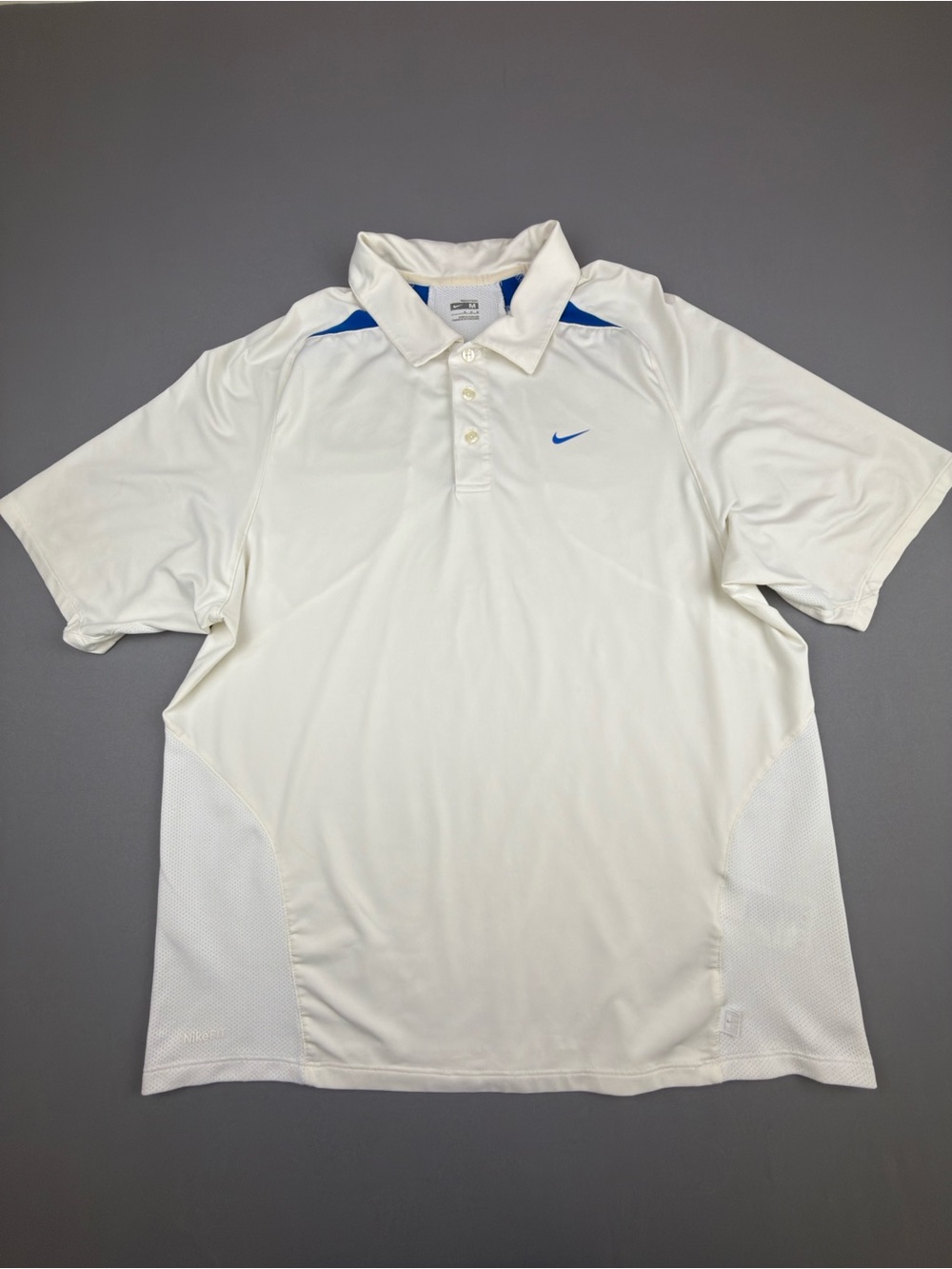 Nike Men’s White Polo with Blue Swoosh